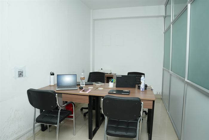 A wider view of the empty Begnas team cabin at Stratex