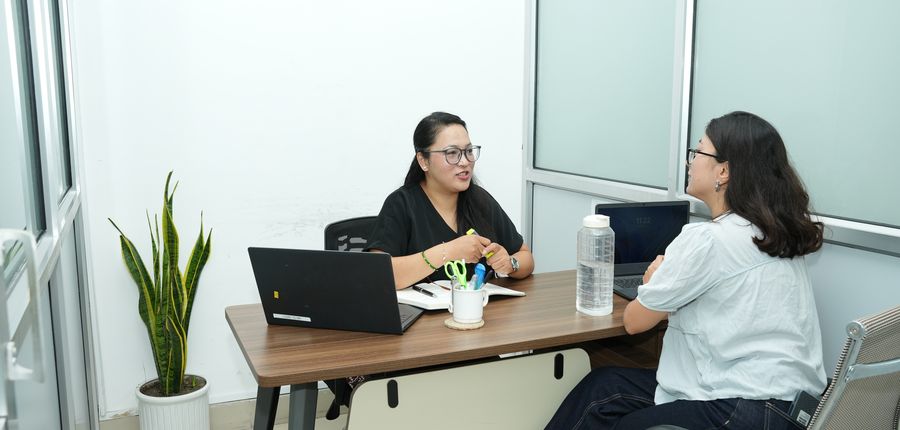 Two members working in the Fewa private cabin at Stratex