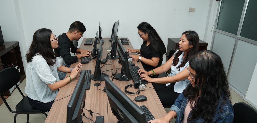 Rows of individual workstations in the Rupa team cabin at Stratex