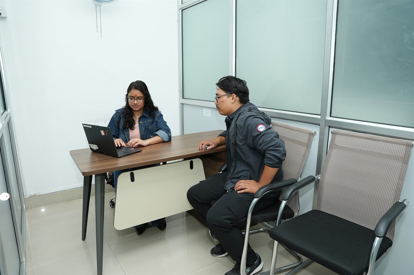Two members working together in the Fewa private cabin at Stratex