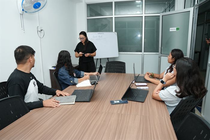 A whiteboard presentation to the team in the Gosaikunda cabin at Stratex