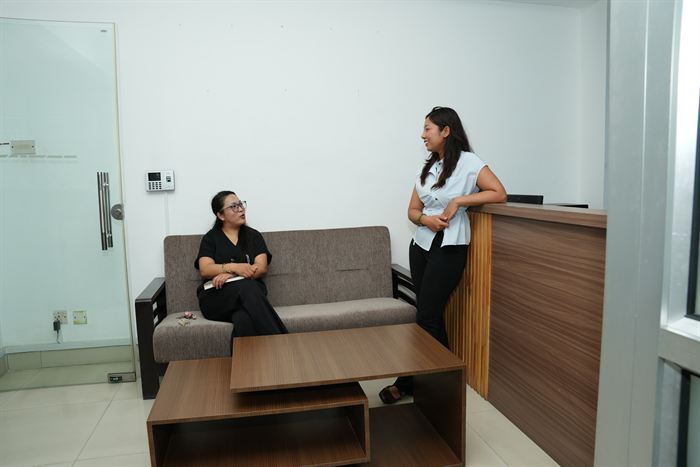 Sofa seating in the Tilicho front cabin beside the reception desk at Stratex